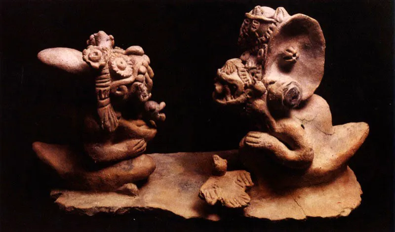 Escena ceremonial con figuras antropozoomorfas con compleja y enarbolada indumentaria que hace alusión a un ritual con la figura del sacerdo-
tejaguar. En el evento parti-cipan otros animales sagrados como la serpiente y un aviforme.