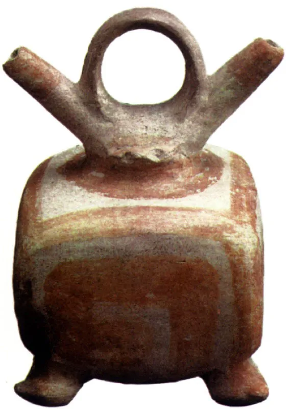 Alcarraza cerámica de doble vertedera y asa puente característica de
los Desarrollos Regionales en la zona de Tumaco. Nótese la “greca?espiral” como elemento decorativo principal.
