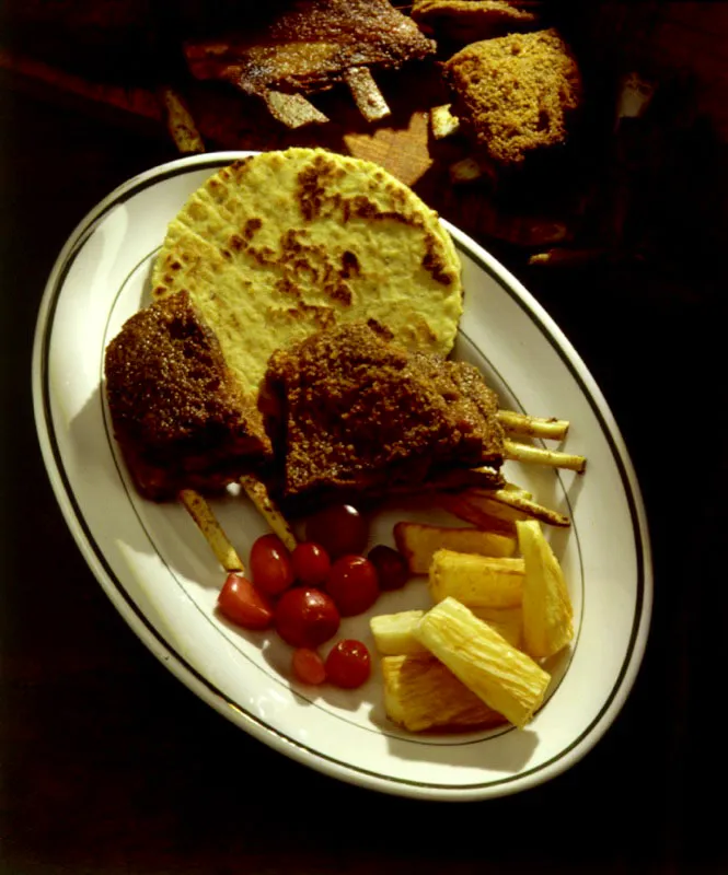 Cabro al horno y Arepa santandereana.