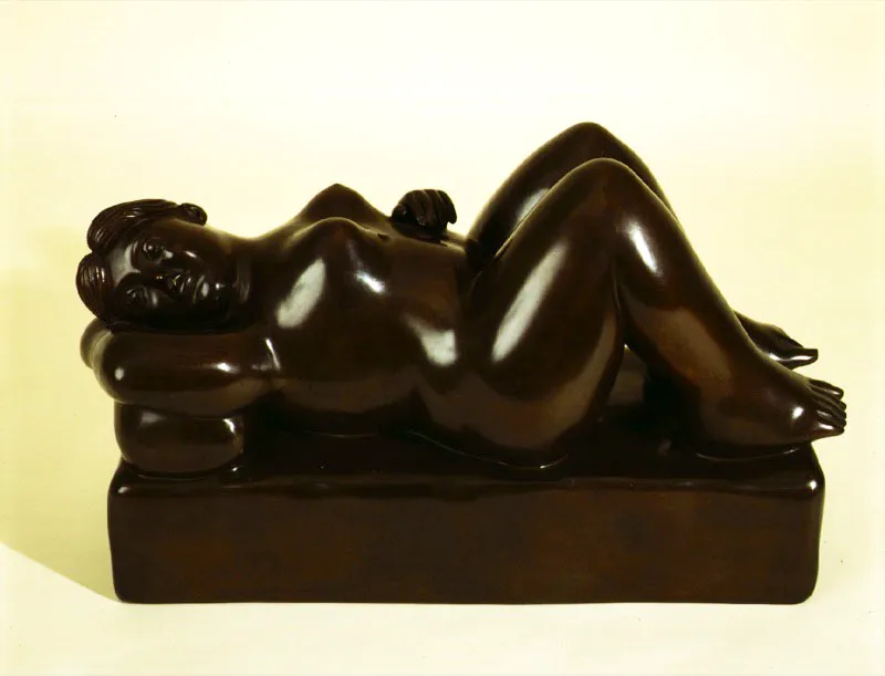 Mujer acostada.  
1990.  
Bronce, edicin de 6.  
29 x 46,5 x 18,5 cm.  