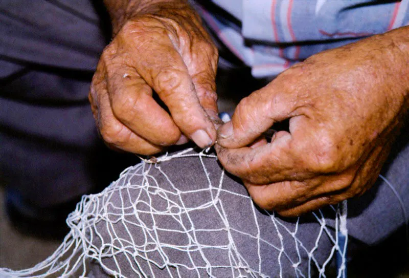 Remendando la red. Piedras, Tolima. José Fernando Machado