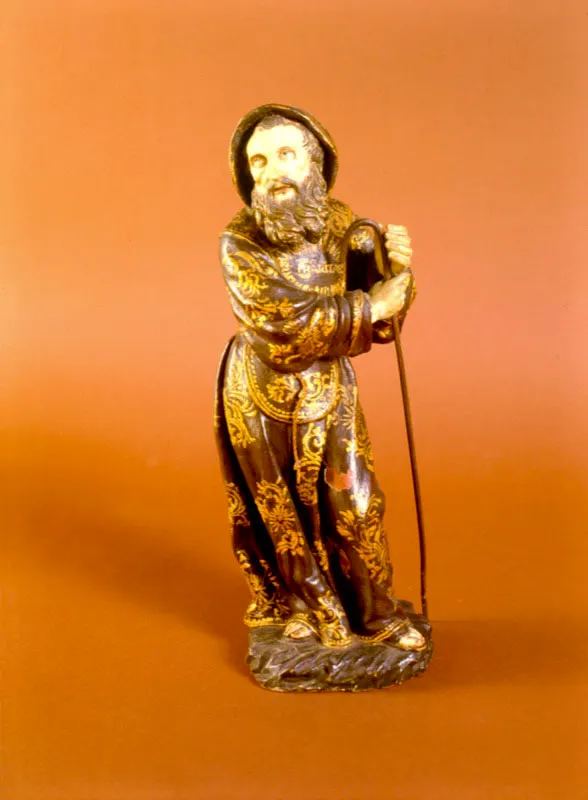 Atribuido a Pedro Laboria.
	San Francisco de Paula. Siglo XVIII.
	Terracota policromada.
	Ojos de vidrio. Rostro de estao.
	64 x 39 x 24 cm.
 