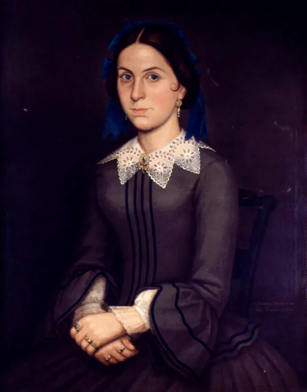 Anónimo. Rosalía Copete, 1858.
Óleo sobre lienzo, 98,5 x 82 cm
Durante el siglo xix, se popularizó cada vez más el género del retrato, que en el período colonial había sido privilegio exclusivo de los representantes de la realeza en el país. Sin embargo, el retrato no cambió su carácter exclusivista, sencillamente se desplazó hacia las nuevas franjas selectas de la sociedad. Dentro del abanico de retratos realizados en el siglo xix y buena parte del xx, sólo encontramos hombres y mujeres blancos, vestidos al estilo de la capital. Rosalia Copete, por ejemplo, aparece como una mujer digna y sobria. Las joyas que lleva, así como el discreto gesto de sus manos y su rostro delatan su posición social y educación. Resulta interesante aquí el fuerte contraste entre el rostro y manos contra el fondo y el vestido, elaborados en una gama muy oscura de colores. El cuello y las mangas del traje, así como las joyas, han sido trabajados con sumo cuidado, convirtiéndose en puntos dominantes dentro de la composición, a pesar de su reducido tamaño.