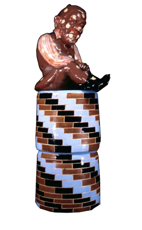 El crítico del Dorado.
1985.
Esmalte sintético sobre materos de barro.
120 x 60 cm.
Colección particular, Bogotá.