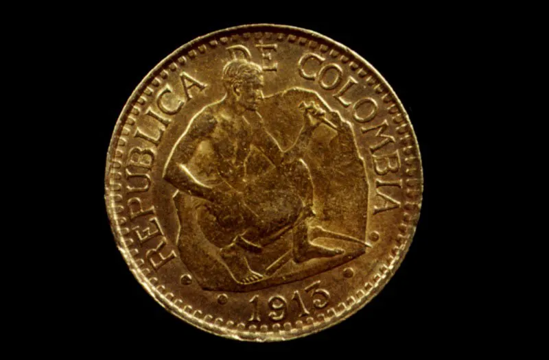 La alegoría de “El Minero”, de Francisco Antonio Cano, sirvió tanto para la acuñación de una moneda en 1915 como para una emisión filatélica en 1932.