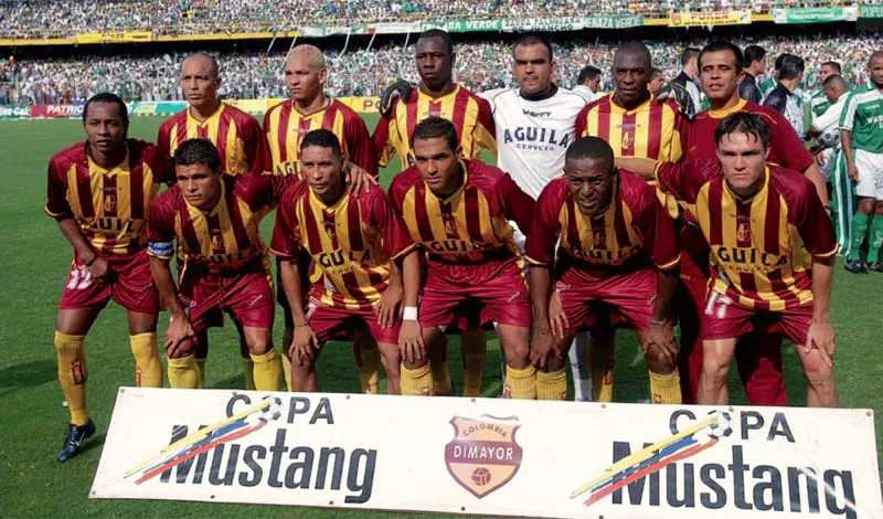 Tolima, campen 2003/II. 
Atrs, de izquierda a derecha: Ricardo Ciciliano, Blmer Aguilar, Nelson Rivas, Diego Gmez, Arley Dinas y Freddy Hurtado.
Adelante: Hernando Patio, Henry Zambrano, scar Passo, Rogeiro Pereira y Giovanni Garca. 