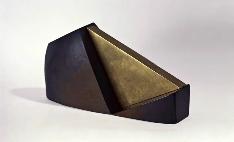 REFLEXIN. 
1987. 
Ensamble en lutita y bronce. 
40 x 21 x 12 cm aprox. 