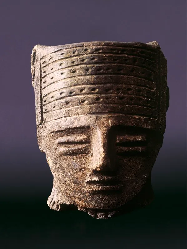 Recipiente antropomorfo.