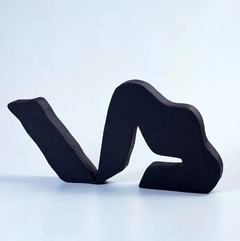 Signo rompimiento / 2006 / Escultura en bronce / 25 x 51 x 5 cm